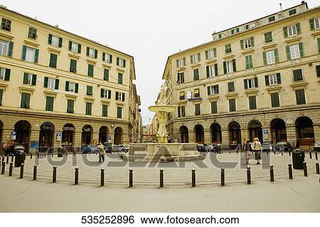 Fountain in front of buildings, Piazza Colombo, Genoa, Liguria, Italy View Large Photo Image Stock Photograph - Fountain in front of buildings, Piazza Colombo, Genoa, Liguria, Italy. Fotosearch