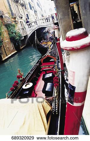 Gondolas in a canal, Grand Canal, Venice, Veneto, Italy View Large Photo Image Stock Photo - Gondolas in a canal, Grand Canal, Venice, Veneto, Italy. Fotosearch
