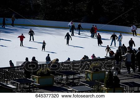Group of people skating in an ice rink, Central park, Manhattan, New York City, New York State, USA View Large Photo Image Stock Image - Group of people skating in an ice rink, Central park, Manhattan, New York City, New York State, USA. Fotosearch