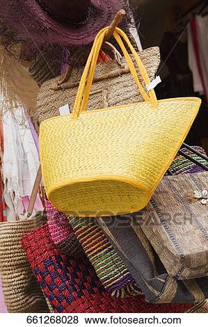 Hand bags at a market stall, Cinque Terre National Park, Via Roma, Vernazza, La Spezia, Liguria, Italy View Large Photo Image Stock Photo - Hand bags at a market stall, Cinque Terre National Park, Via Roma, Vernazza, La Spezia, Liguria, Italy. Fotosearch
