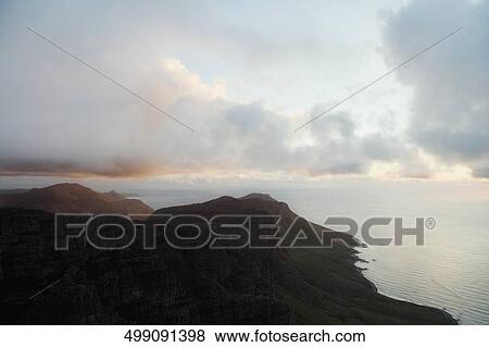 Stock Photo - High angle view of a coast. Fotosearch