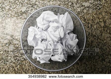 Stock Image - High angle view of a garbage bin. Fotosearch