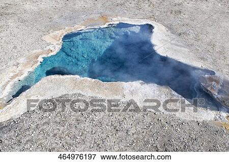 Stock Photo - High angle view of a natural geyser, Old Faithful, Upper Geyser Basin, Yellowstone National Park, Wyoming, USA. Fotosearch