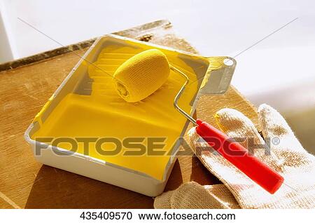 High angle view of a paint tray with a paint roller View Large Photo Image Stock Image - High angle view of a paint tray with a paint roller. Fotosearch