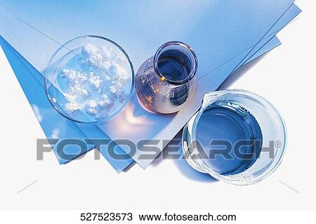 High angle view of a pitcher of water and a bowl of cream with sheets of paper View Large Photo Image Stock Image - High angle view of a pitcher of water and a bowl of cream with sheets of paper. Fotosearch