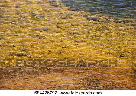 High angle view of a rippled water surface View Large Photo Image Stock Image - High angle view of a rippled water surface. Fotosearch