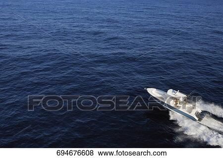 High angle view of a speedboat in the sea View Large Photo Image Stock Photo - High angle view of a speedboat in the sea. Fotosearch