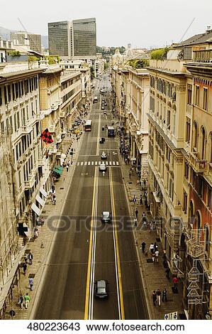 Stock Image - High angle view of a street in a city, Via Venti Settembre, Corte Dei Lambruschini, Genoa, Liguria, Italy. Fotosearch