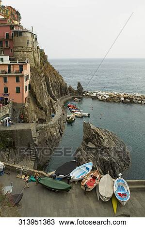 High angle view of boat at the coast, Cinque Terre, Manarola, La Spezia, Liguria, Italy View Large Photo Image Stock Image - High angle view of boat at the coast, Cinque Terre, Manarola, La Spezia, Liguria, Italy. Fotosearch