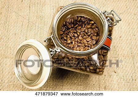 High angle view of coffee beans in a jar View Large Photo Image Stock Photo - High angle view of coffee beans in a jar. Fotosearch