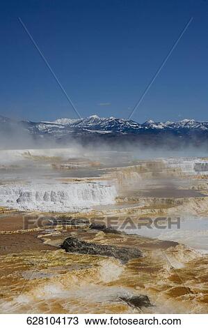 High angle view of steam emerging from a hot spring, Angel Terrace, Mammoth Hot Springs, Yellowstone National Park, Wyoming, USA View Large Photo Image Stock Image - High angle view of steam emerging from a hot spring, Angel Terrace, Mammoth Hot Springs, Yellowstone National Park, Wyoming, USA. Fotosearch