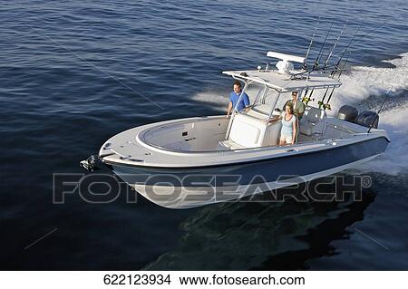 High angle view of tourists on a speedboat View Large Photo Image Picture - High angle view of tourists on a speedboat. Fotosearch