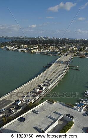 High angle view of traffic on a bridge, John F. Kennedy Causeway, Miami, Florida, USA View Large Photo Image Stock Image - High angle view of traffic on a bridge, John F. Kennedy Causeway, Miami, Florida, USA. Fotosearch