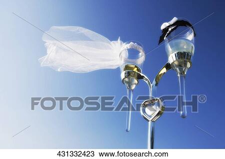 Low angle view of a champagne glass holder View Large Photo Image Stock Image - Low angle view of a champagne glass holder. Fotosearch