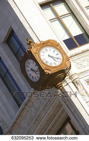 Low angle view of a clock hanging on a building, Washington DC, USA View Large Photo Image Stock Image - Low angle view of a clock hanging on a building, Washington DC, USA. Fotosearch