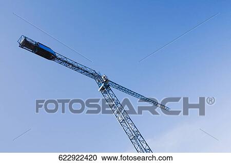 Low angle view of a crane View Large Photo Image Stock Image - Low angle view of a crane. Fotosearch