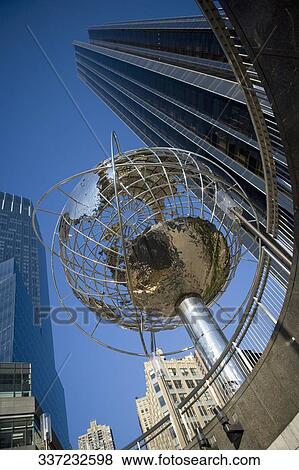 Low angle view of a globe sculpture in front of a building, Columbus Circle, Manhattan, New York City, New York State, USA View Large Photo Image Stock Photo - Low angle view of a globe sculpture in front of a building, Columbus Circle, Manhattan, New York City, New York State, USA. Fotosearch
