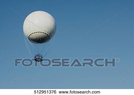 Stock Photograph - Low angle view of a hot air balloon. Fotosearch