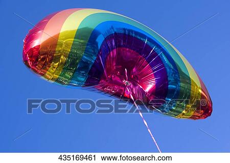 Stock Image - Low angle view of a multi-colored balloon, Boys Town, Chicago, Illinois, USA. Fotosearch