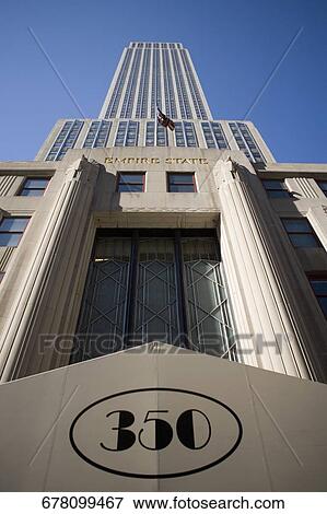 Low angle view of a skyscraper, Empire State Building, Manhattan, New York City, New York State, USA View Large Photo Image Stock Photo - Low angle view of a skyscraper, Empire State Building, Manhattan, New York City, New York State, USA. Fotosearch