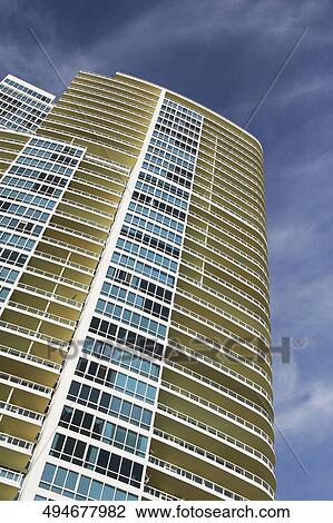 Stock Image - Low angle view of a skyscraper. Fotosearch