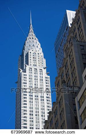 Low angle view of a skyscraper, Chrysler Building, Manhattan, New York City, New York State, USA View Large Photo Image Stock Photo - Low angle view of a skyscraper, Chrysler Building, Manhattan, New York City, New York State, USA. Fotosearch
