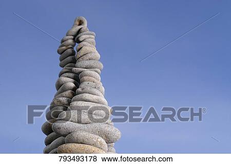 Low angle view of a stack of pebbles View Large Photo Image Stock Photo - Low angle view of a stack of pebbles. Fotosearch