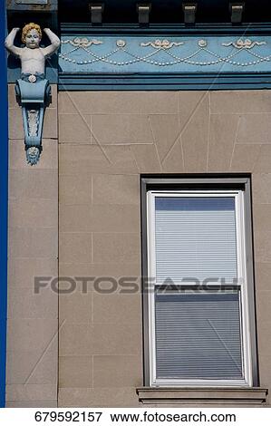 Low angle view of a statue on a building, Boys Town, Chicago, Illinois, USA View Large Photo Image Stock Photo - Low angle view of a statue on a building, Boys Town, Chicago, Illinois, USA. Fotosearch