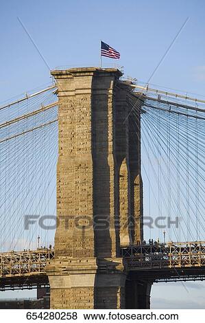 Low angle view of a suspension bridge, Brooklyn Bridge, East River, New York City, New York State, USA View Large Photo Image Stock Photo - Low angle view of a suspension bridge, Brooklyn Bridge, East River, New York City, New York State, USA. Fotosearch