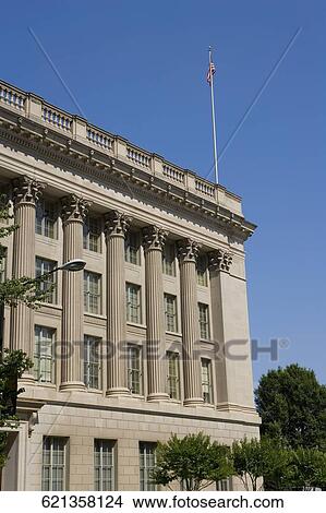 Low angle view of an American flag on a building, Washington DC, USA View Large Photo Image Picture - Low angle view of an American flag on a building, Washington DC, USA. Fotosearch