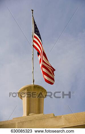 Low angle view of an American flag on a temple, Masonic Temple, Washington DC, USA View Large Photo Image Stock Image - Low angle view of an American flag on a temple, Masonic Temple, Washington DC, USA. Fotosearch