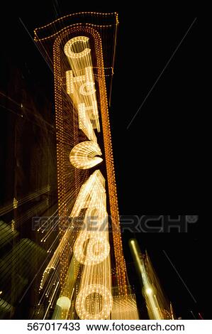 Stock Image - Low angle view of an information board, Chicago Theater, Chicago, Illinois, USA. Fotosearch