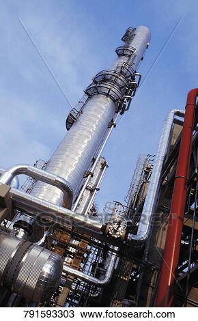 Low angle view of an oil refinery View Large Photo Image Stock Image - Low angle view of an oil refinery. Fotosearch
