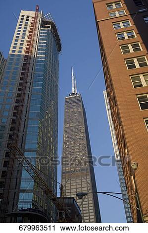 Low angle view of buildings in a city, Hancock Building, Chicago, Illinois, USA View Large Photo Image Stock Image - Low angle view of buildings in a city, Hancock Building, Chicago, Illinois, USA. Fotosearch