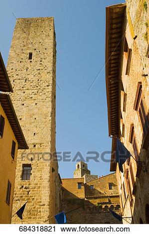 Stock Image - Low angle view of buildings in a city, Monteriggioni, Siena Province, Tuscany, Italy. Fotosearch
