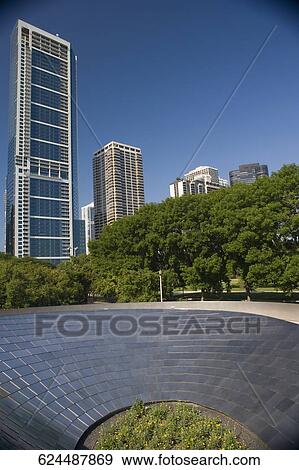 Low angle view of buildings in a city, Millennium Park, Chicago, Illinois, USA View Large Photo Image Stock Photo - Low angle view of buildings in a city, Millennium Park, Chicago, Illinois, USA. Fotosearch