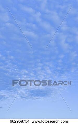 Low angle view of clouds in the sky View Large Photo Image Picture - Low angle view of clouds in the sky. Fotosearch