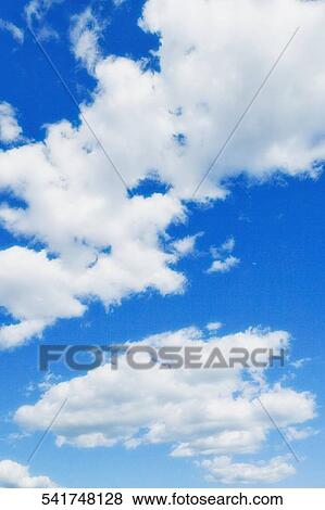 Low angle view of clouds in the sky View Large Photo Image Stock Photo - Low angle view of clouds in the sky. Fotosearch