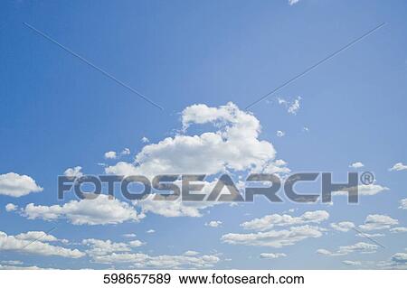Low angle view of clouds in the sky View Large Photo Image Stock Photo - Low angle view of clouds in the sky. Fotosearch