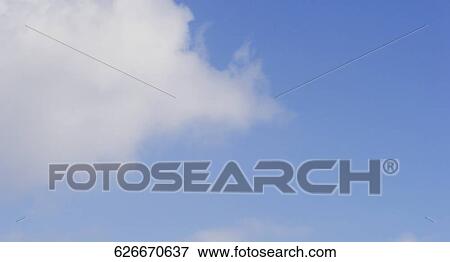 Low angle view of clouds in the sky View Large Photo Image Stock Photo - Low angle view of clouds in the sky. Fotosearch