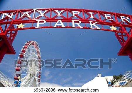 Low angle view of ferris wheel in an amusement park, Navy Pier Park, Navy Pier, Chicago, Illinois, USA View Large Photo Image Stock Photograph - Low angle view of ferris wheel in an amusement park, Navy Pier Park, Navy Pier, Chicago, Illinois, USA. Fotosearch