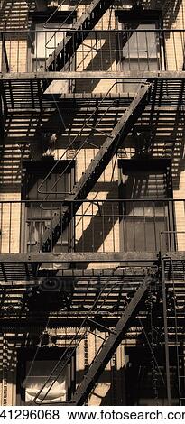 Low angle view of fire escape View Large Photo Image Stock Photo - Low angle view of fire escape. Fotosearch