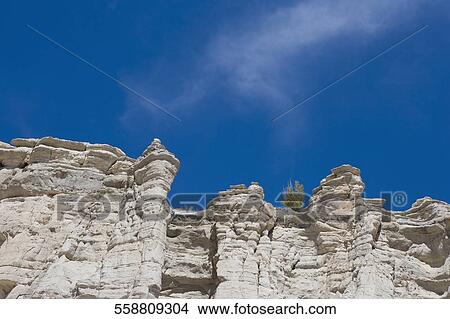 Picture - Low angle view of rock formations. Fotosearch
