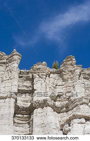 Low angle view of rock formations View Large Photo Image Stock Image - Low angle view of rock formations. Fotosearch