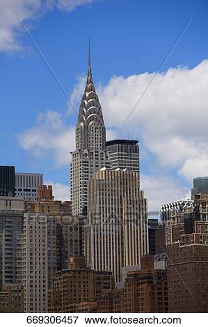 Low angle view of skyscrapers in a city, Chrysler Building, Manhattan, New York City, New York State, USA View Large Photo Image Stock Photo - Low angle view of skyscrapers in a city, Chrysler Building, Manhattan, New York City, New York State, USA. Fotosearch