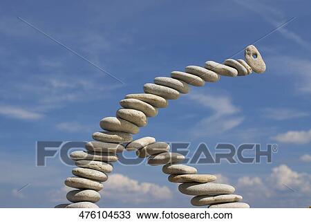 Stock Image - Low angle view of stacks of pebbles. Fotosearch