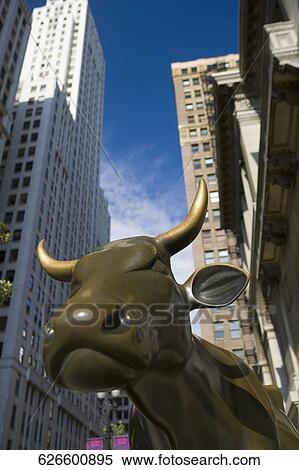 Low angle view of the bronze sculpture of a cow, Hanig Cow, Chicago, Illinois, USA View Large Photo Image Stock Photography - Low angle view of the bronze sculpture of a cow, Hanig Cow, Chicago, Illinois, USA. Fotosearch