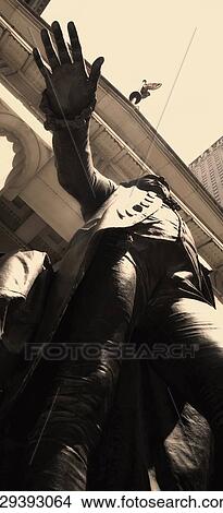 Low angle view of the George Washington statue, Wall Street, Manhattan, New York City, New York State, USA View Large Photo Image Picture - Low angle view of the George Washington statue, Wall Street, Manhattan, New York City, New York State, USA. Fotosearch