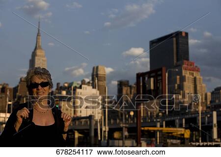 Mature woman smiling View Large Photo Image Stock Photo - Mature woman smiling. Fotosearch