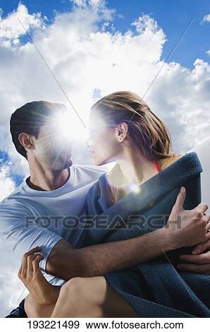 Mid adult couple romancing View Large Photo Image Stock Photo - Mid adult couple romancing. Fotosearch